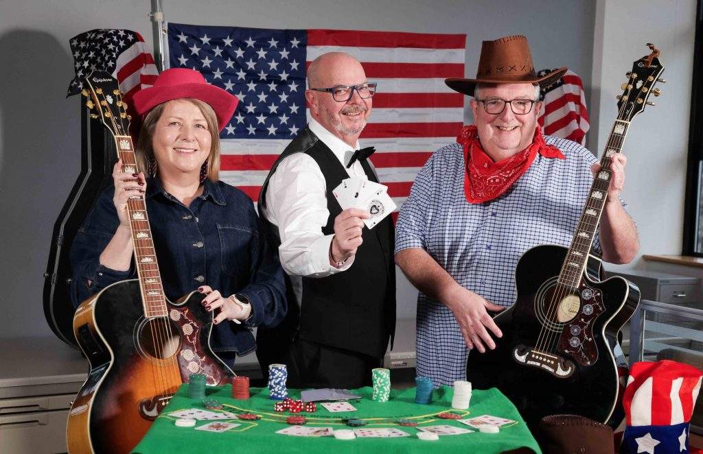 TRANSATLANTIC TREAT: Visitors to the 33rd annual Holiday World Show Belfast in association with Bookit by NI Travel News in January are in for a transatlantic treat with the unveiling of the show’s first ever dedicated USA Pavilion. Managed by Travel Solutions, NI’s biggest provider of holidays to the USA, the Pavilion will feature star-spangled holidays to a range of truly iconic destinations including Nashville, Las Vegas, Philadelphia, Atlantic City, Oregon and Oklahoma. Getting into a right State at the launch of the USA Pavilion are (l-r) Maria Hourican, CEO of event organiser BizEx, Jonathan Adair of headline sponsor Bookit by NI Travel News, and Peter McMinn, Managing Director of Travel Solutions. Holiday World Show Belfast takes place at the ICC Belfast at The Waterfront Hall from Friday January 9 until Sunday January 11. For more information, visit www.holidayworldshowni.com.