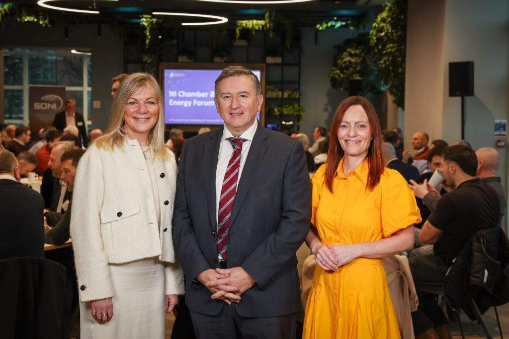  A group pose together at an energy forum event.