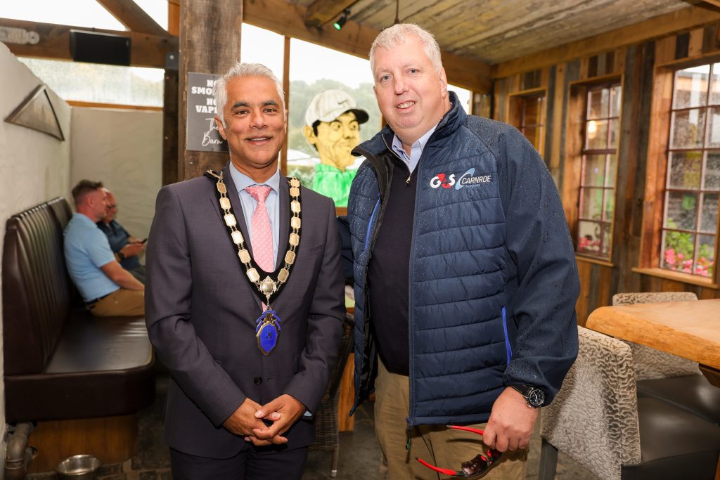 NI Chamber president, Kailash Chada standing in the Barn at Galgorm Castle with G4S's Kevin Scruby. 