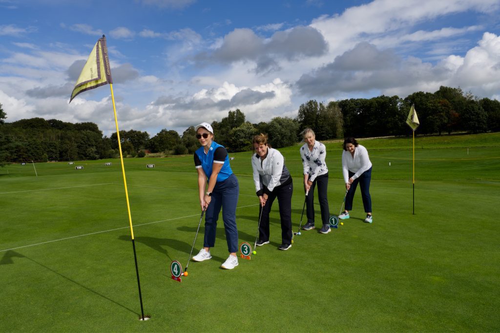 NI Chamber Annual Golf day. shots of NI Chamber CEO and three female golfers.