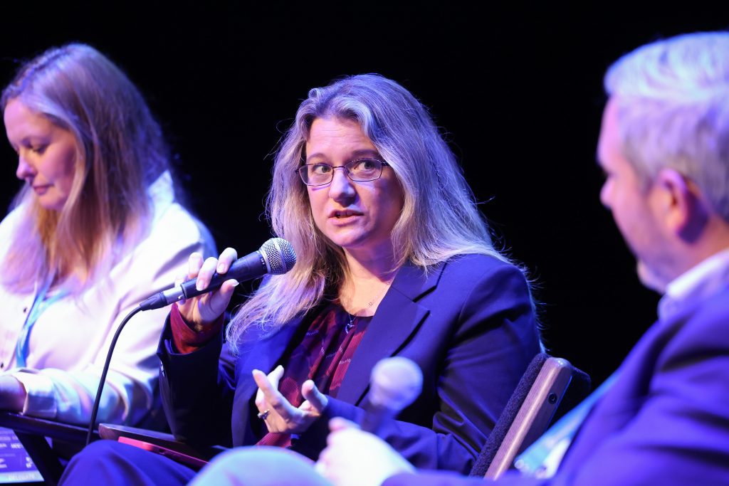 one of the panellists speaking into the mic