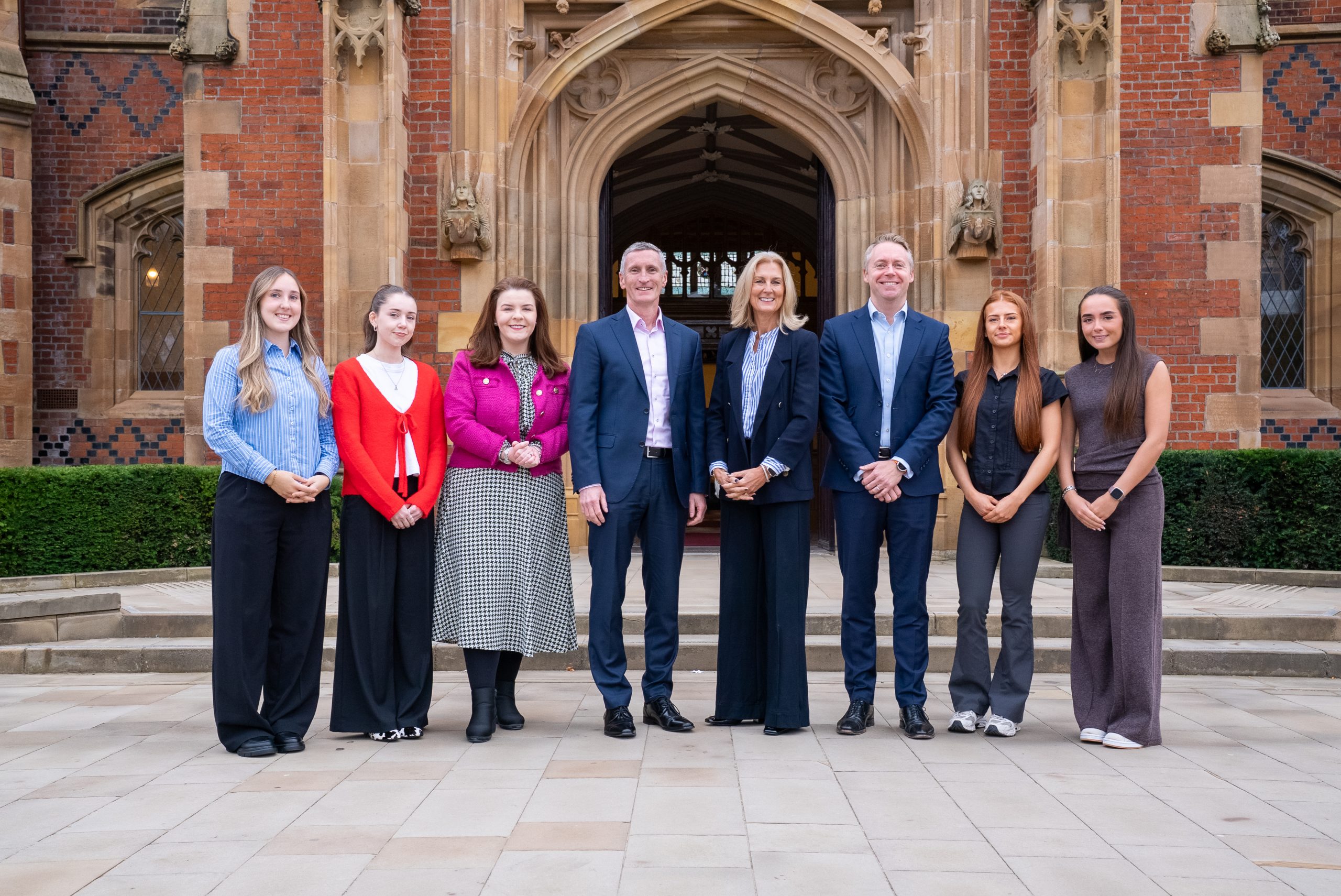 Photographed at the front of the Lanyon are four of the graduate trainees: Laura McCullough, Zoe Taylor, Nicole Woods and Hannah Wylie, as well as Queen’s Vice-President and Chief Finance and Resources Officer, Patrick Anderson, and Director of Finance, Matthew Graham, with Zara Duffy, Executive Head of Global Engagement at CAI, and her colleague Sinead Fox-Hamilton, Relationship and Professional Development Manager.