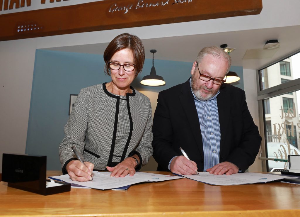 Professor Judy Williams, Pro-Vice-Chancellor for Education and Students at Queen's, and Damian Duffy, Interim Principal & Chief Executive at Belfast Metropolitan College, pictured at the signing of the Memorandum of Intent at Belfast Met's Titanic Quarter campus