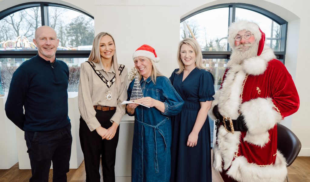 Jonathan, Mandy and Rachel from Earlview Primary School who received the highest number for nominations this year for their Outdoor Nativity Scene, winning the Reason for the Season Award