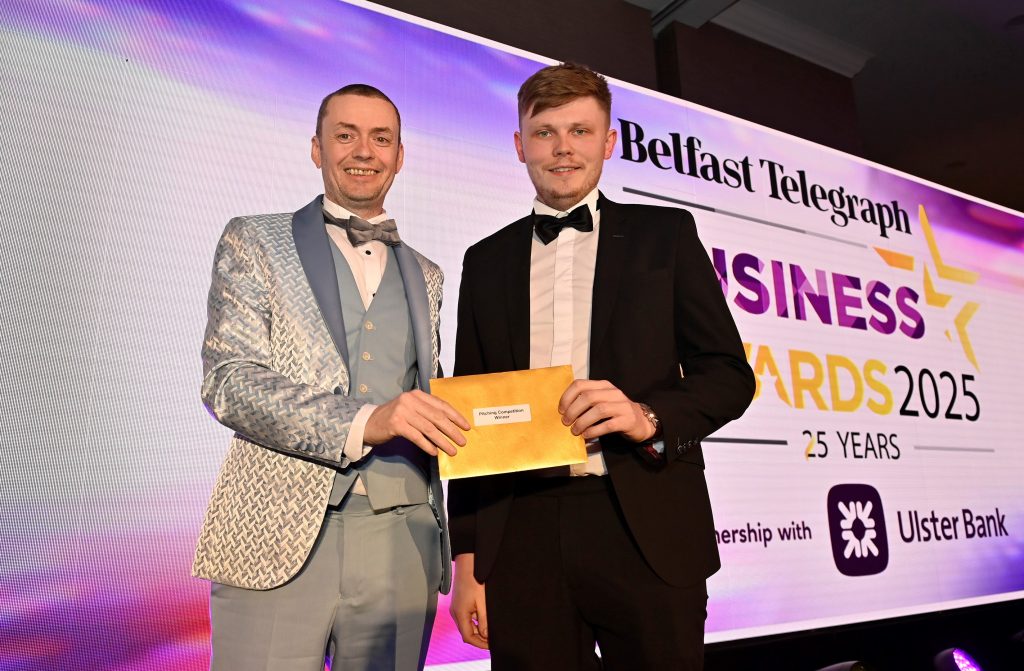 Photo Caption 1: Winner of the 2025 pitch competition, Gareth McDonald, Founder of Farmdrive, receives his prize from Ulster Bank’s John Ferris.